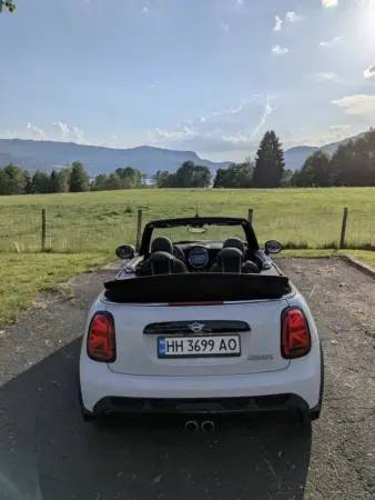 Foto 06 mini cooper s cabrio 2024 white rear roof open
